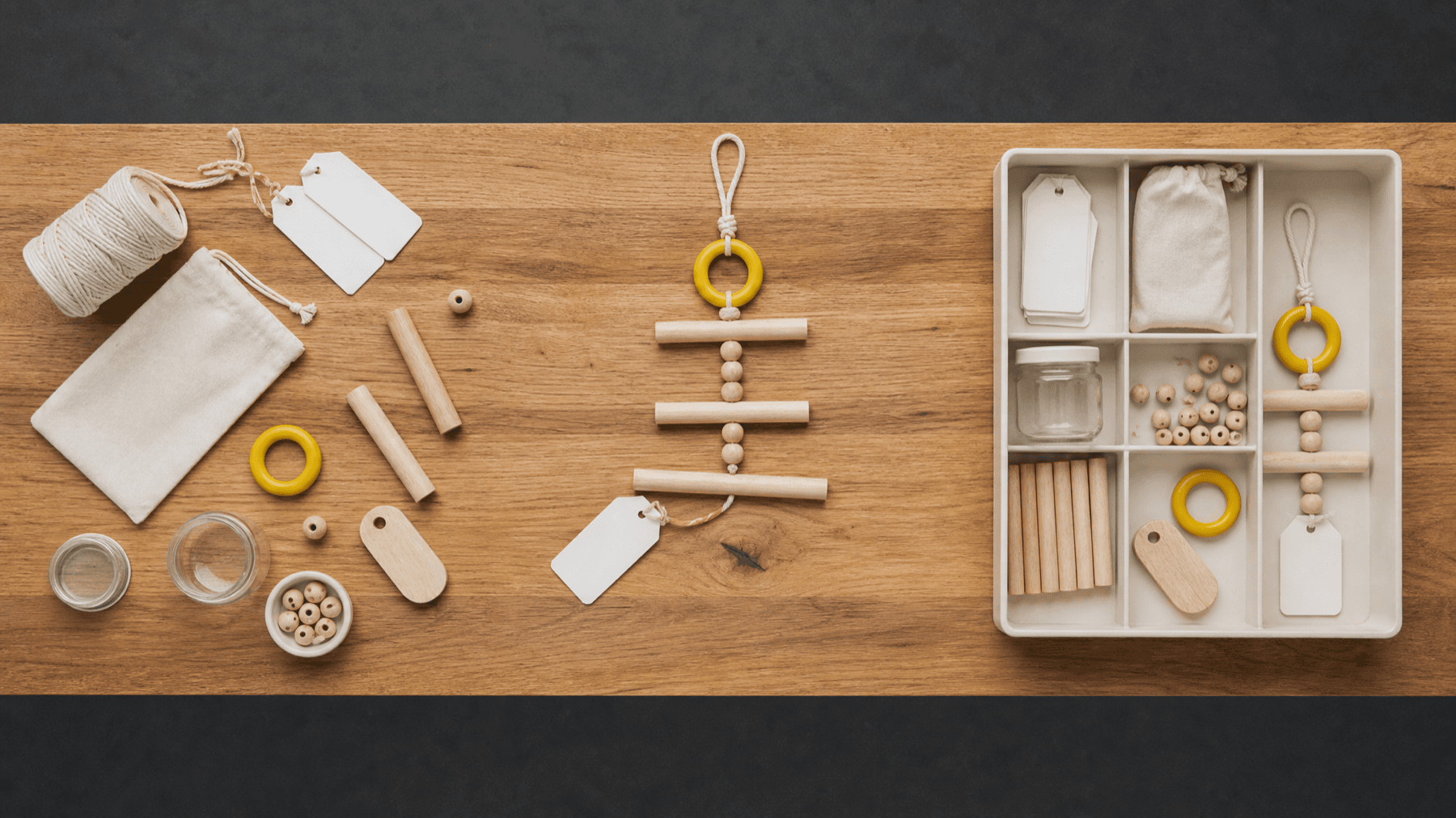 Three stages on a workbench: loose materials, a piece being made, and the finished piece stored in a divided tray